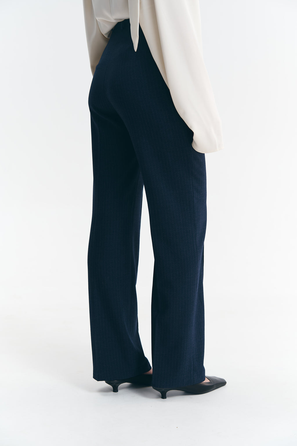 Брюки у смужку