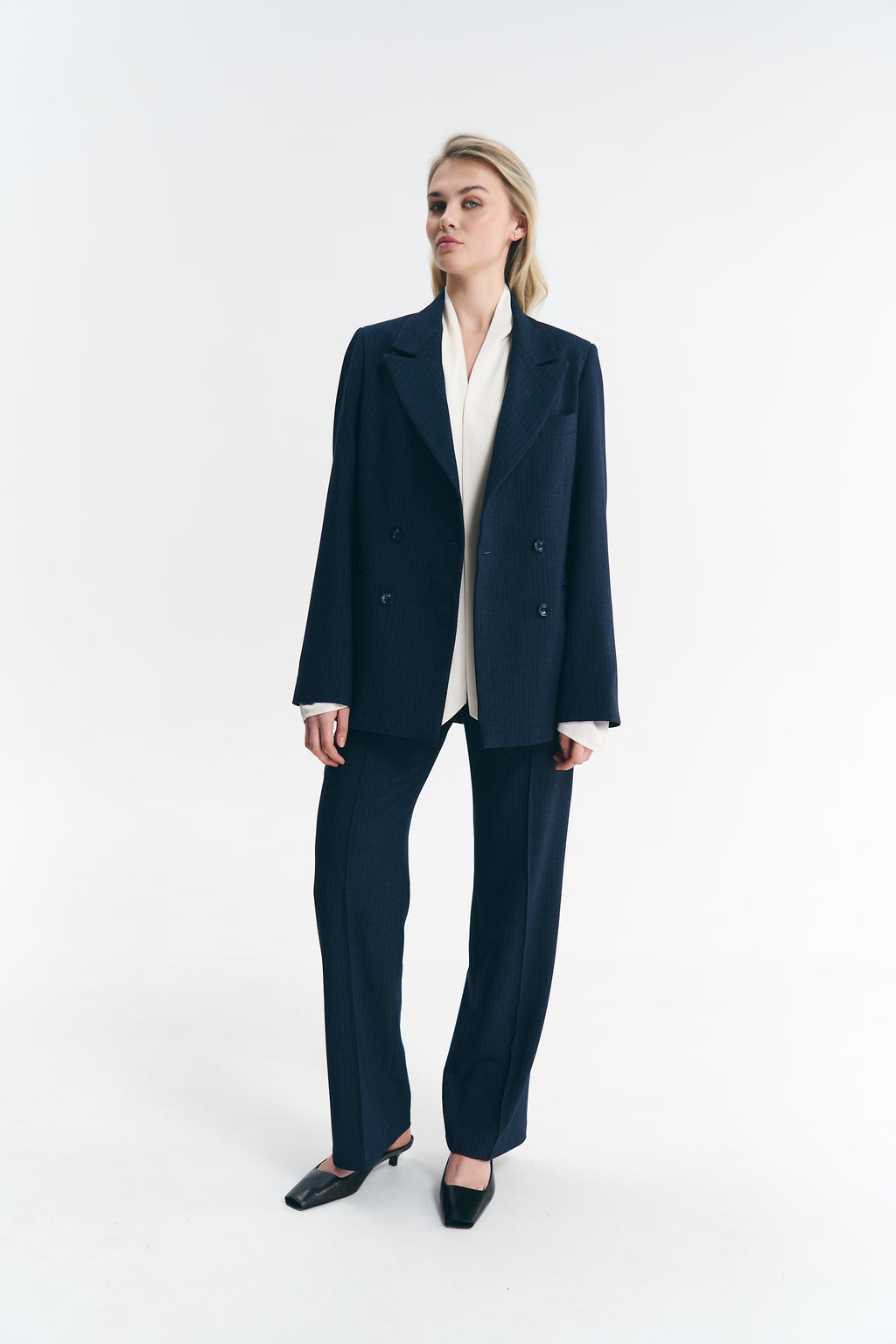 Брюки у смужку