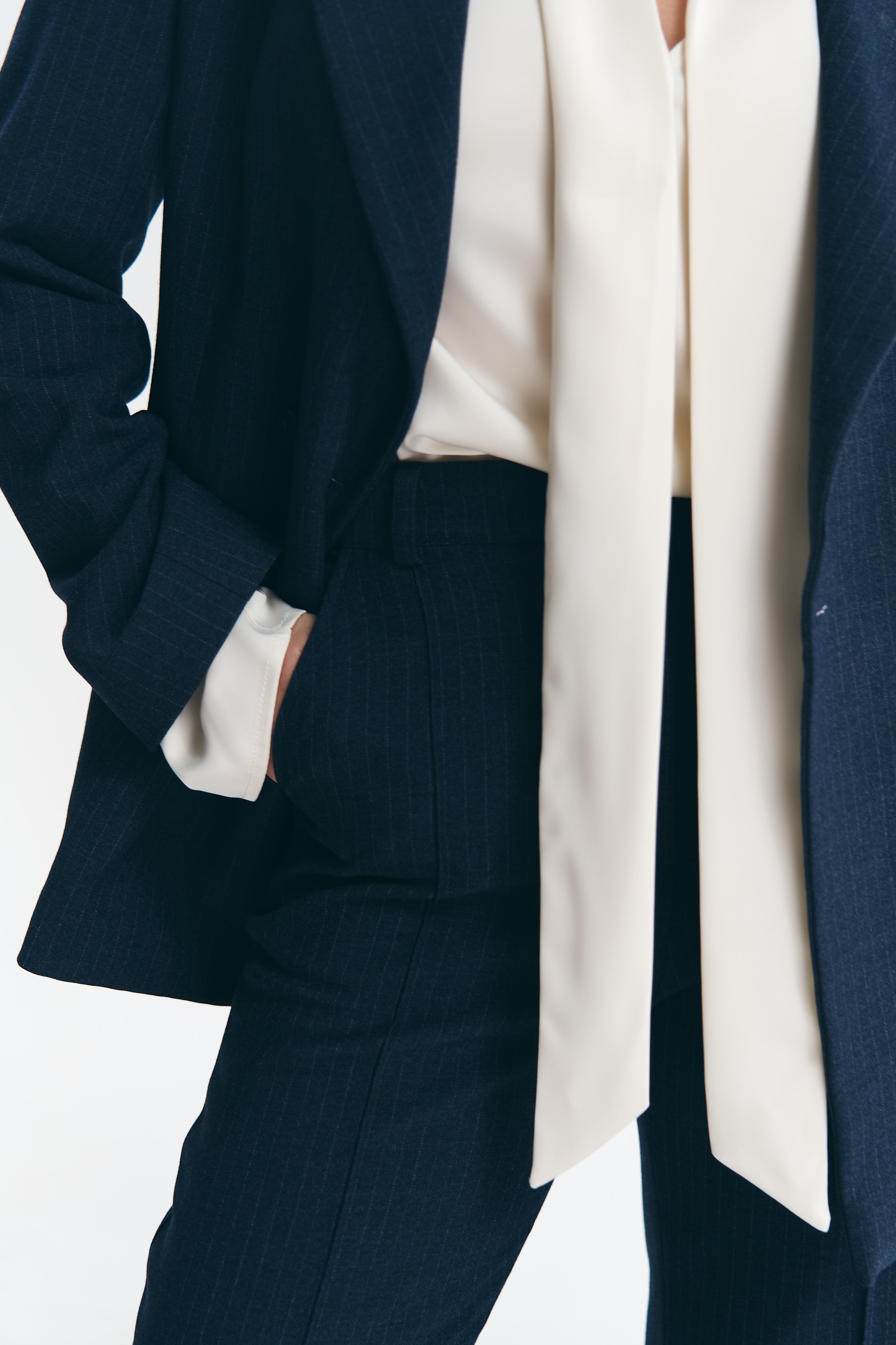 Брюки у смужку