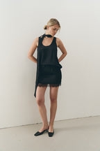 Сатинова міні спідниця з мереживом