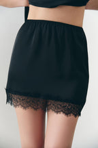 Сатинова міні спідниця з мереживом